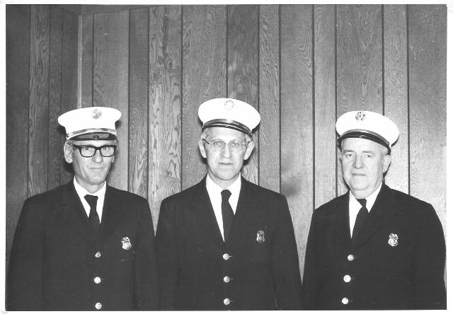 Chiefs 1973: Left to Right 2nd Assistant Chief Real LaVoie, 1st Assistant Chief Karl Kueng, Chief Bill Lynch Jr.